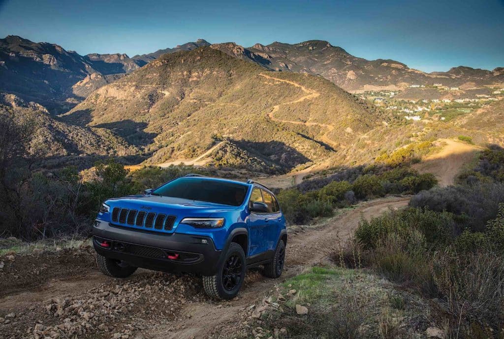 A 2022 Jeep Cherokkee driving off road.