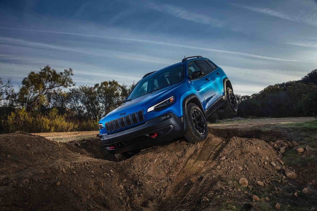 A 2022 Jeep Cherokkee driving off road.