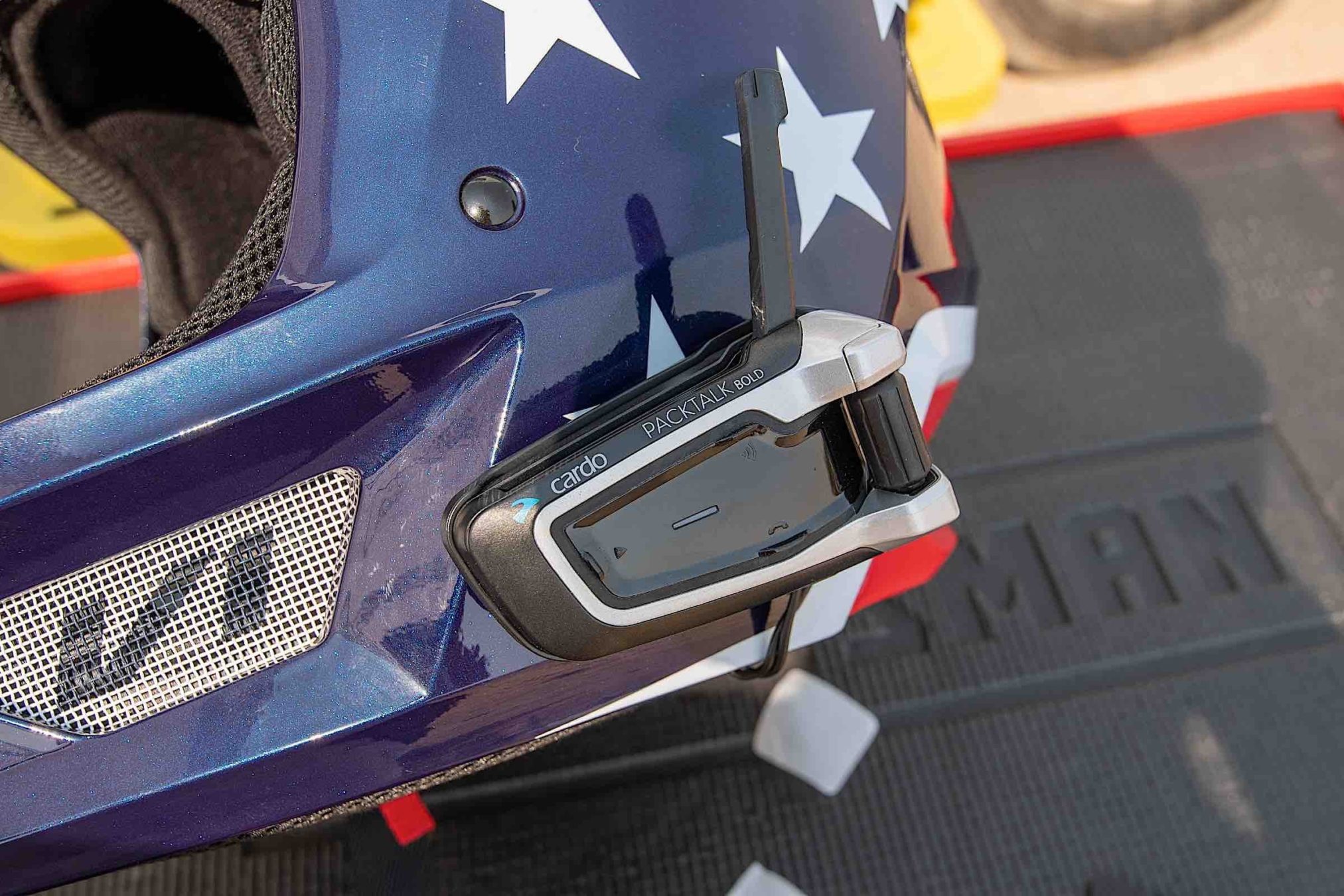 Cardo Systems Packtalk Bold on an American flag helmet