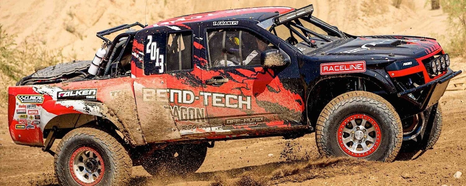 Bend-Tech Clinical Racing Truck through the mud.
