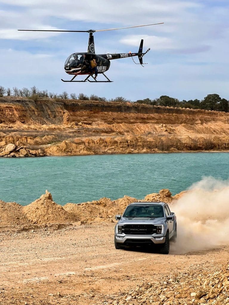 A Ford F150 truck and a helicopter.