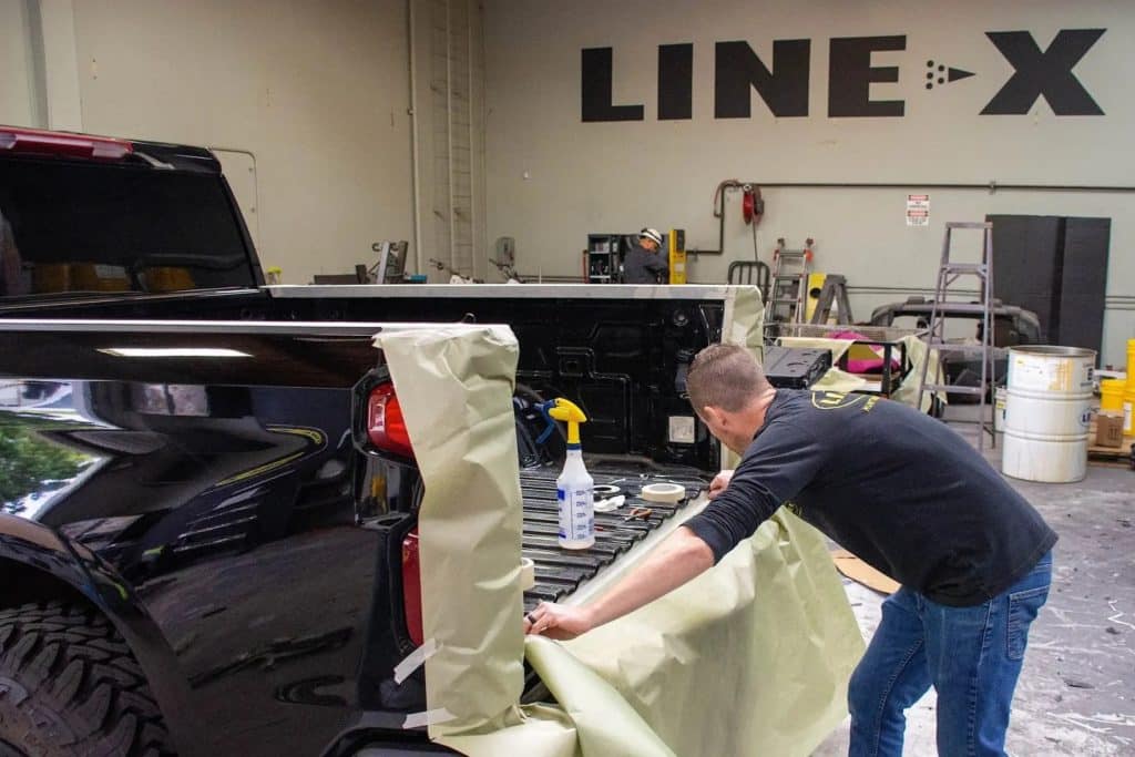 A truck bed coated with A Line-X Bedliner