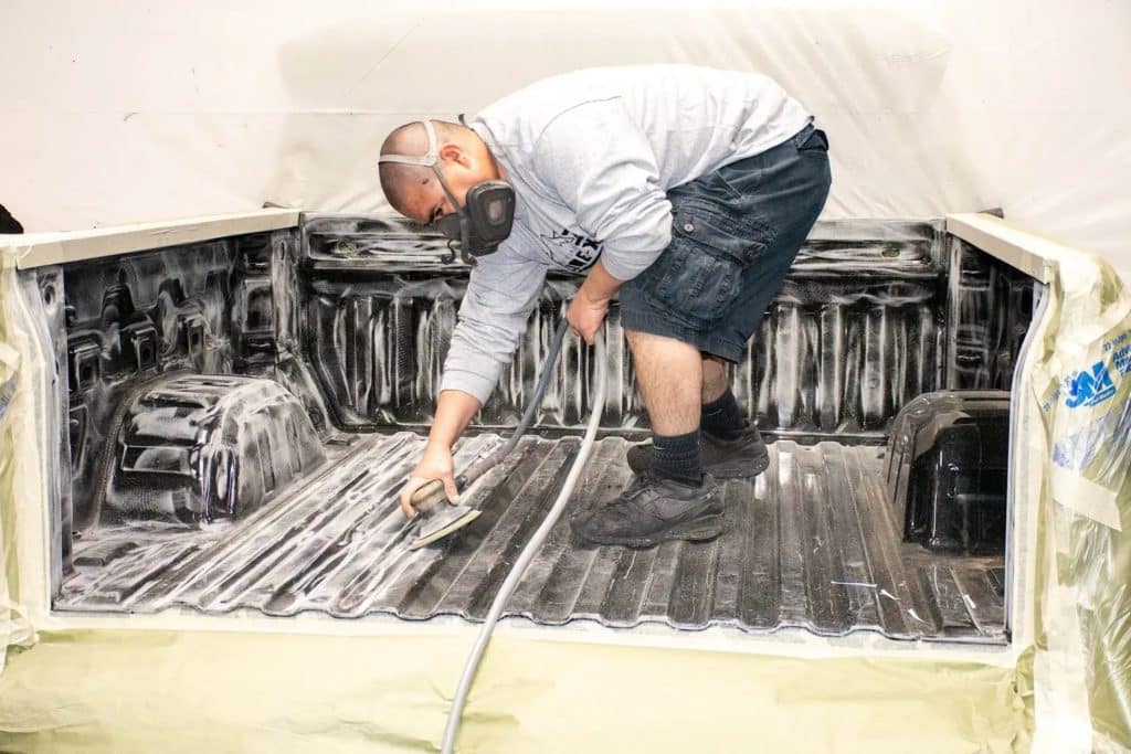 A truck bed coated with A Line-X Bedliner