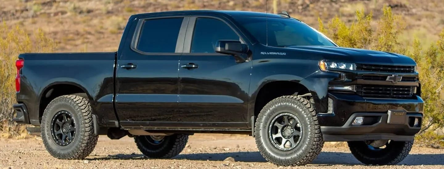 A 2019 Chevrolet Silverado on a dirt road.