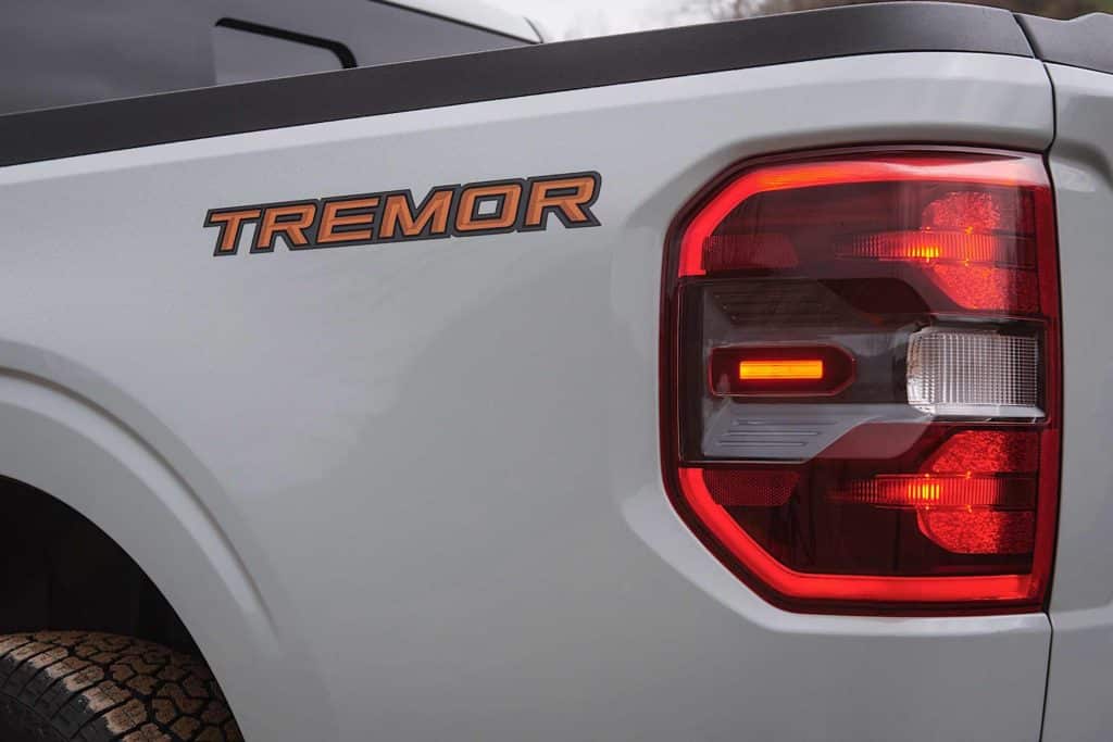 The rear tailight of a 2023 Ford Maverick truck.