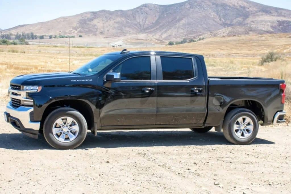 A 2019 Chevrolet Silverado on a dirt road.